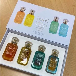 Kayali vacay in a bottle Mini Perfume Set - Orange, Yellow, Green, Blue see use.